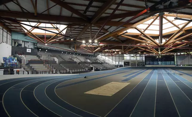 Sunlight streams through a skylight at the Stephane Diagana stadium in the base camp for the U.S athletes at the Paris 2024 Olympic Games, Thursday, June 13, 2024, in Eaubonne, a suburb north of Paris. (AP Photo/Thibault Camus)