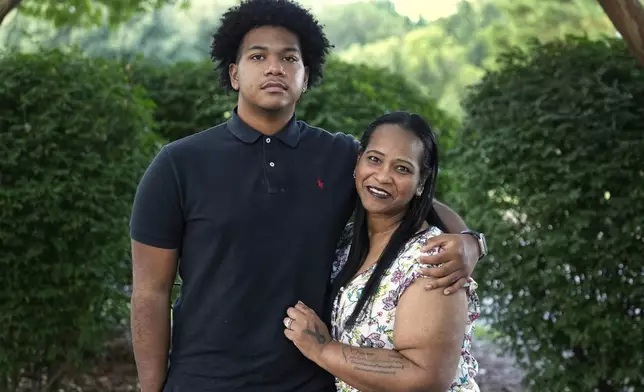 Robin Alderman, right, and her son, Camden Alderman, 21, pose for a portrait near their home in Greensboro, N.C., Wednesday, June 12, 2024. Camden, 21, was diagnosed as a baby with a rare disease called Wiskott-Aldrich syndrome, which is caused by a mutated gene on the X chromosome. It primarily affects boys – up to 10 out of every million — and can cause frequent infections, eczema and excessive bleeding. (AP Photo/Chuck Burton)