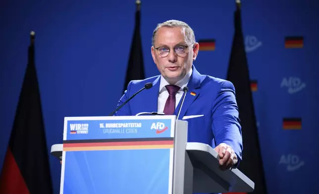 Tino Chrupalla, national chairman of the AfD, speaks at the AfD's national party conference in Essen, Germany, Saturday June 29, 2024. (Bernd von Jutrczenka/dpa via AP)