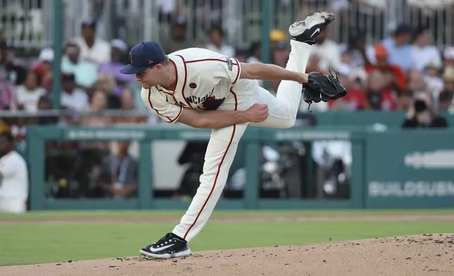San Francisco Giants starting pitcher Keaton Winn throws during the first inning of a baseball game against the St. Louis Cardinals at Rickwood Field, Thursday, June 20, 2024, in Birmingham, Ala. (AP Photo/Vasha Hunt)