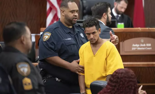 Franklin Peña, one of the two men accused of killing 12-year-old Jocelyn Nungaray, is led out of the courtroom after bail was set for $10 million, Monday, June 24, 2024, in Houston. Peña and another man, Johan Jose Rangel-Martinez, are charged with capital murder over the girl's death. (Brett Coomer/Houston Chronicle via AP)