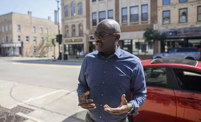 Emmanuel McKinstry speaks about the upcoming election Wednesday, June 19, 2024, in downtown Racine, Wis. (AP Photo/Jeffrey Phelps)