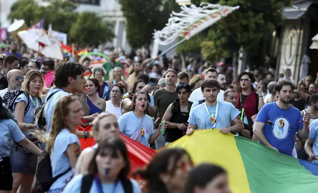 Revellers take part in EuroPride, a pan-European international LGBTI event featuring a Pride parade which is hosted in a different European city each year, in the northern port city of Thessaloniki, Greece, Saturday, June 29, 2024. (AP Photo/Giannis Papanikos)