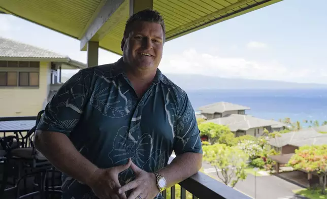 Jeremy Stice, who manages more than 40 vacation rental properties, poses for a portrait at The Ridge Villas on Monday, June 24, 2024, in Lahaina, Hawaii. The mayor of Maui County in Hawaii wants to stop owners of thousands of vacation properties from renting to visitors. Instead, he wants the units rented long-term to people who live on Maui to address a chronic housing shortage that intensified after last August’s deadly wildfire. (AP Photo/Mengshin Lin)