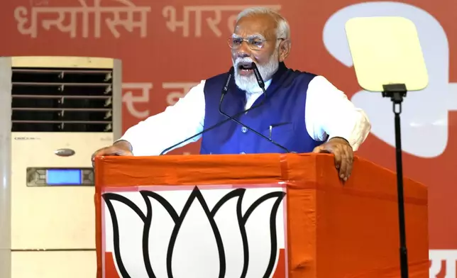 Prime Minister Narendra Modi addresses supporters at the Bharatiya Janata Party (BJP) headquarters in New Delhi, India, Tuesday, June 4, 2024. (AP Photo/Manish Swarup)