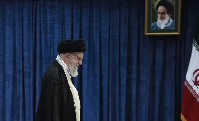 Iranian Supreme Leader Ayatollah Ali Khamenei leaves after casting his vote during the presidential election, in Tehran, Iran, Friday, June 28, 2024. Iranians were voting Friday in a snap election to replace the late President Ebrahim Raisi, killed in a helicopter crash last month, as public apathy has become pervasive in the Islamic Republic after years of economic woes, mass protests and tensions in the Middle East. (AP Photo/Vahid Salemi)