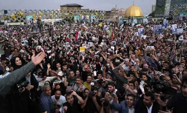 Supporters of Saeed Jalili, a candidate for the June 28, presidential election, attend his campaign rally in Tehran, Iran, Monday, June 24, 2024. (AP Photo/Vahid Salemi)