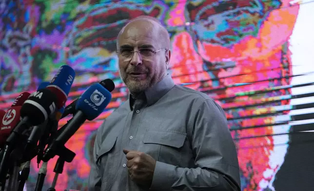 Mohammad Bagher Qalibaf, the most prominent candidate for the June 28, presidential election, who is Iran's parliament speaker, speaks during his campaign rally in Tehran, Iran, Tuesday, June 18, 2024. (AP Photo/Vahid Salemi)