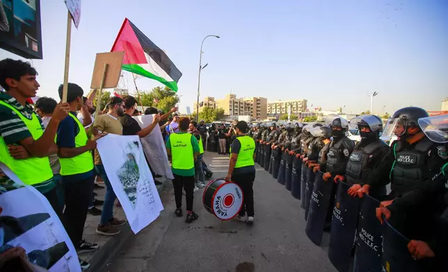 Iraqis stage an anti-U.S. protest in Baghdad, Iraq, Friday, May 31, 2024. The recent protests — apparently organised by supporters of Iran-backed, anti-American militias in Iraq — reflect surging anger against the United States, Israel’s top ally, over the war in Gaza. (AP Photo/Anmar Khalil)