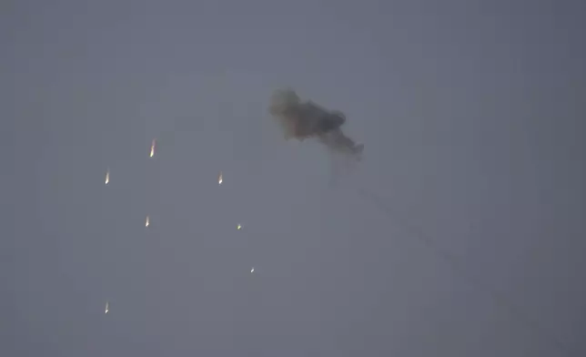 Israeli Iron Dome air defense system fires to intercept rockets fired from the Gaza Strip, in southern Israel, Thursday, June 13, 2024. The army is battling Palestinian militants across Gaza in the war ignited by Hamas' Oct. 7 attack into Israel. (AP Photo/Ohad Zwigenberg)