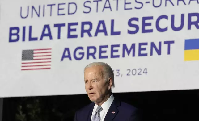 U.S. President Joe Biden listens to a question during a news conference after signing a bilateral security agreement with Ukraine's President Volodymyr Zelenskyy during the sidelines of the G7 summit at Savelletri, Italy, Thursday, June 13, 2024. (AP Photo/Andrew Medichini)