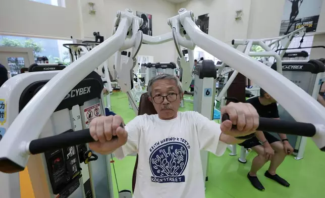 Toshiyuki Honma, 70, uses a chest press machine as he works out at the Fukagawa Sports Center in Tokyo, Wednesday, June 12, 2024. If you are getting up there in years, weight-resistance training might deliver unexpected benefits. (AP Photo/Hiro Komae)