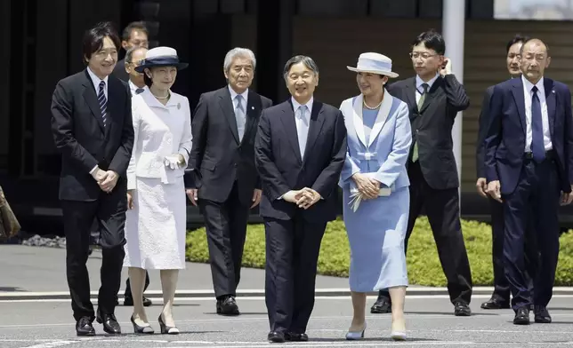 Japanese Emperor Naruhito, center left, and Empress Masako, center right, smile as they depart for the state visit to Britain, at Haneda airport in Tokyo, Japan, Saturday, June 22, 2024. Japanese Crown Prince Akishino is seen at left, while Crown Princess Kiko is at second left. (Kyodo News via AP)