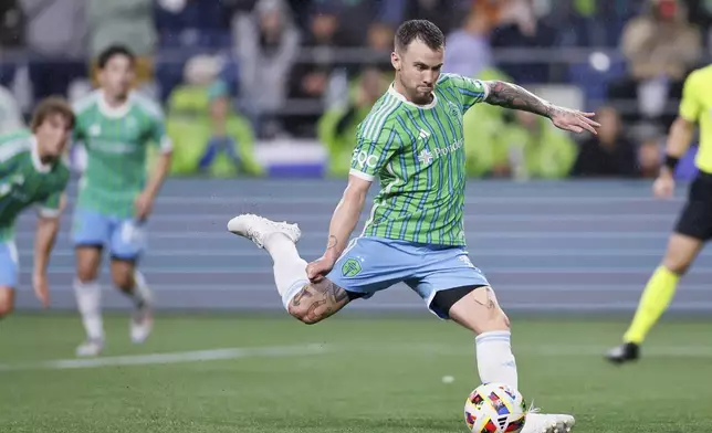 Seattle Sounders midfielder Albert Rusnák scores on a penalty kick against the Chicago Fire during the second half of an MLS soccer match Saturday, June 29, 2024 in Seattle. (Jennifer Buchanan/The Seattle Times via AP)