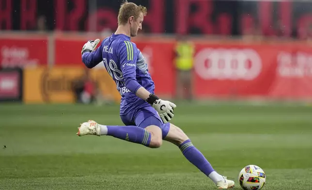 New York Red Bulls goalkeeper Ryan Meara kicks the ball during an MLS soccer match against Toronto FC, Saturday, June 22, 2024, in Harrison, N.J. (AP Photo/Julia Nikhinson)