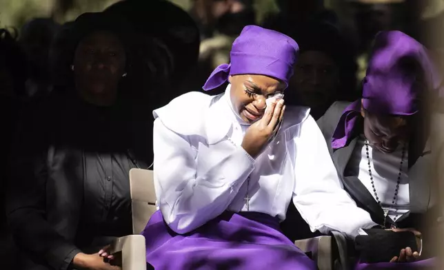 The wife of Malawian Vice President Mary Chilima, weeps at the burial service for Malawi's Vice President Saulos Chilima in Nsipe, Malawi, Monday, June 17, 2024. (AP Photo/Thoko Chikondi)