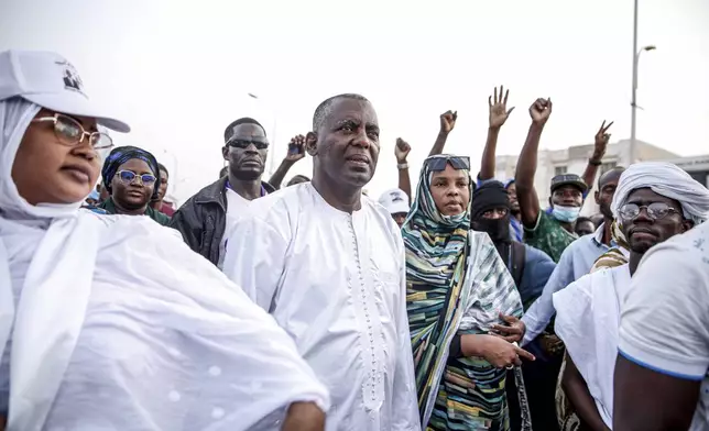 Presidential candidate Biram Ould Dah Ould Abeid, center, takes part in a rally among his supporters, ahead of the presidential election end of the month, in Nouakchott, Mauritania, Monday, June 24, 2024. (AP Photo/Mamsy Elkeihel)