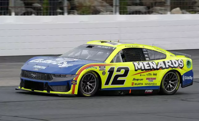 Ryan Blaney steers his car out of Turn 4 during a NASCAR Cup Series race, Sunday, June 23, 2024, at New Hampshire Motor Speedway, in Loudon, N.H. (AP Photo/Steven Senne)
