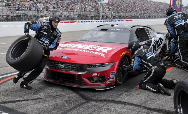 Josh Berry brings his car into the pit for tires and fuel during during a NASCAR Cup Series race, Sunday, June 23, 2024, at New Hampshire Motor Speedway, in Loudon, N.H. (AP Photo/Steven Senne)