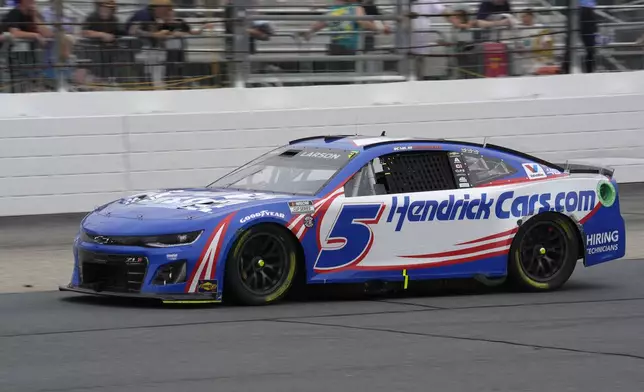Kyle Larson steers his car out of Turn 4 during a NASCAR Cup Series race, Sunday, June 23, 2024, at New Hampshire Motor Speedway, in Loudon, N.H. (AP Photo/Steven Senne)