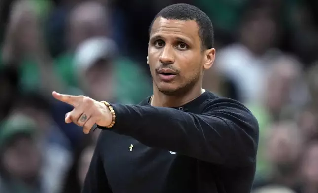 Boston Celtics head coach Joe Mazzulla calls to his players during the second half of Game 2 of the NBA Finals basketball series against the Dallas Mavericks, Sunday, June 9, 2024, in Boston. (AP Photo/Steven Senne)