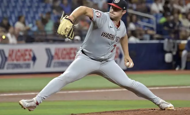 Washington Nationals starter Mitchell Parker pitches against the Tampa Bay Rays during the first inning of a baseball game Friday, June 28, 2024, in St. Petersburg, Fla. (AP Photo/Steve Nesius)