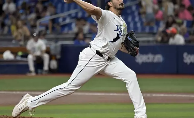 Tampa Bay Rays starter Zach Eflin pitches against the Washington Nationals during the first inning of a baseball game Friday, June 28, 2024, in St. Petersburg, Fla. (AP Photo/Steve Nesius)