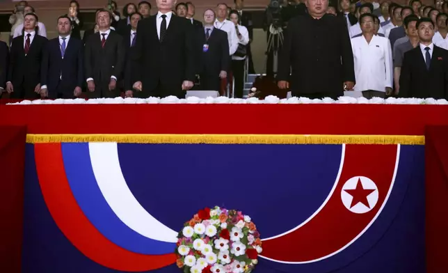 Russian President Vladimir Putin, center left, and North Korea's leader Kim Jong Un, center right, attend a gala concert in Pyongyang, North Korea, on Wednesday, June 19, 2024. (Gavriil Grigorov, Sputnik, Kremlin Pool Photo via AP)