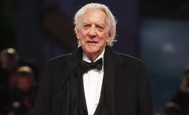 FILE - Actor Donald Sutherland appears at the premiere of the film "The Burnt Orange Heresy" at the 76th edition of the Venice Film Festival, Venice, Italy, on Sept. 7, 2019. Sutherland, the towering Canadian actor whose career spanned "M.A.S.H." to "The Hunger Games," has died at 88. (Photo by Arthur Mola/Invision/AP, File)