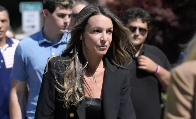 Karen Read arrives at Norfolk Superior Court, Thursday, June 27, 2024, in Dedham, Mass. Read is on trial, accused of killing her boyfriend Boston police Officer John O'Keefe, in 2022. The jury began deliberations in the trial Tuesday. (AP Photo/Steven Senne)