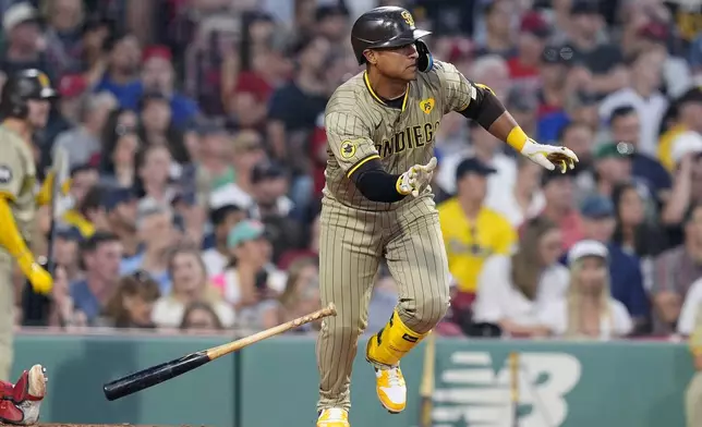 San Diego Padres' Donovan Solano runs on his two-run RBI single during the fifth inning of a baseball game against the Boston Red Sox, Friday, June 28. 2024, in Boston. (AP Photo/Michael Dwyer)
