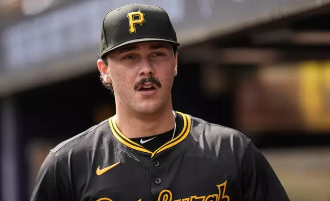 Pittsburgh Pirates pitcher Paul Skenes (30) walks in the dugout in the third inning of a baseball game against the Atlanta Braves, Saturday, June 29, 2024, in Atlanta. (AP Photo/Mike Stewart)