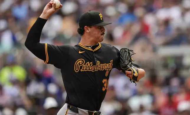 Pittsburgh Pirates pitcher Paul Skenes (30) works from the mound against the Atlanta Braves in the third inning of a baseball game, Saturday, June 29, 2024, in Atlanta. (AP Photo/Mike Stewart)