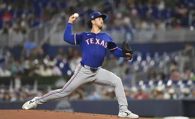 Texas Rangers pitcher Michael Lorenzen throws during the first inning of a baseball game against the Miami Marlins, Saturday, June 1, 2024, in Miami. (AP Photo/Michael Laughlin)