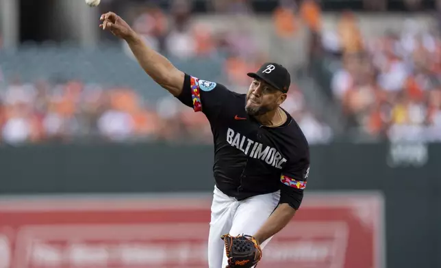 Baltimore Orioles starting pitcher Albert Suarez delivers during the first inning of a baseball game against the Texas Rangers, Friday, June 28, 2024, in Baltimore. (AP Photo/Stephanie Scarbrough)