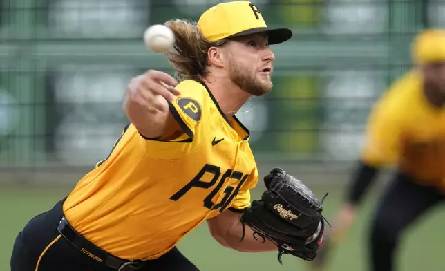 Pittsburgh Pirates starting pitcher Carmen Mlodzinski delivers during the first inning of the team's baseball game against the Tampa Bay Rays in Pittsburgh, Friday, June 21, 2024. (AP Photo/Gene J. Puskar)