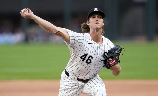 Chicago White Sox starting pitcher Jake Woodford delivers in the first inning of the team's baseball game against the Boston Red Sox on Thursday, June 6, 2024, in Chicago. (AP Photo/Charles Rex Arbogast)