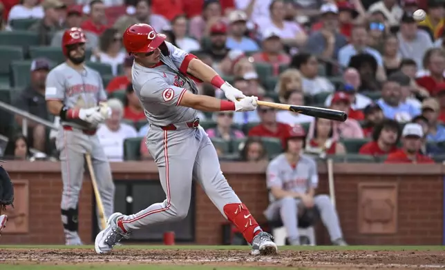 Cincinnati Reds' Spencer Steer hits a two-run home run against the St. Louis Cardinals during the fourth inning of a baseball game Thursday, June 27, 2024, in St. Louis. (AP Photo/Joe Puetz)