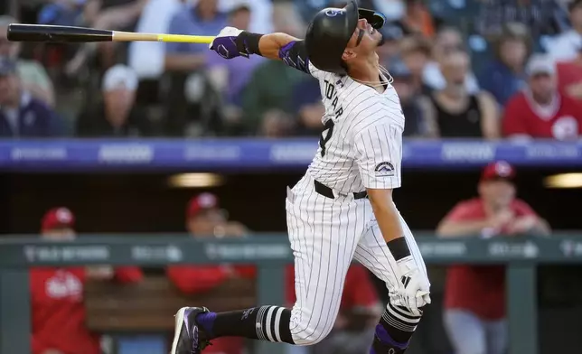 Colorado Rockies' Ezequiel Tovar pops out against Cincinnati Reds starting pitcher Frankie Montas during the fourth inning of a baseball game Tuesday, June 4, 2024, in Denver. (AP Photo/David Zalubowski)