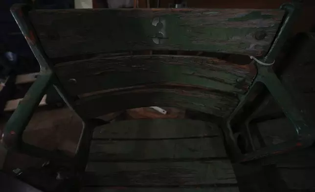 An antique chair, formally used inside Rickwood Field, was put into a storage area, Monday, June 10, 2024, in Birmingham, Ala. Rickwood Field, known as one of the oldest professional ballpark in the United States and former home of the Birmingham Black Barons of the Negro Leagues, will be the site of a special regular season game between the St. Louis Cardinals and San Francisco Giants on June 20, 2024. (AP Photo/Brynn Anderson)