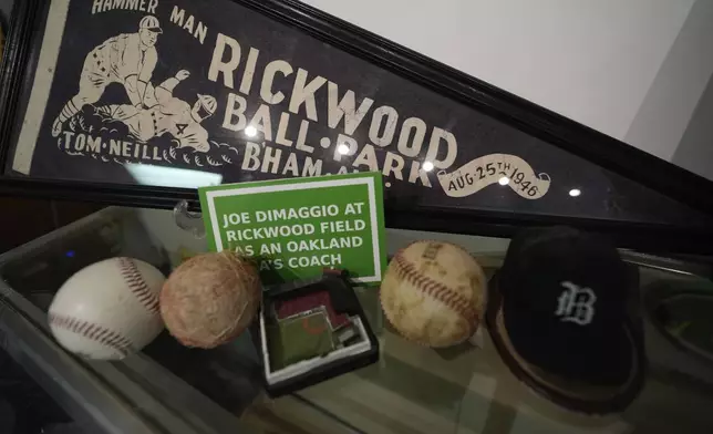 Baseball memorabilia is on display in a shop near Rickwood Field, Monday, June 10, 2024, in Birmingham, Ala. Rickwood Field, known as one of the oldest professional ballpark in the United States and former home of the Birmingham Black Barons of the Negro Leagues, will be the site of a special regular season game between the St. Louis Cardinals and San Francisco Giants on June 20, 2024. (AP Photo/Brynn Anderson)