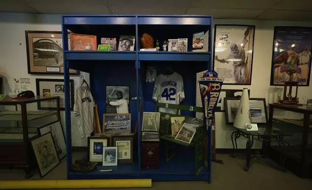 A display shows memorabilia, Monday, June 10, 2024, from a film called "42" that was filmed at Rickwood Field, in Birmingham, Ala. Rickwood Field, known as one of the oldest professional ballpark in the United States and former home of the Birmingham Black Barons of the Negro Leagues, will be the site of a special regular season game between the St. Louis Cardinals and San Francisco Giants on June 20, 2024. (AP Photo/Brynn Anderson)