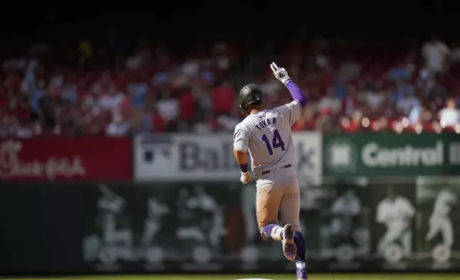 Colorado Rockies' Ezequiel Tovar celebrates after hitting a two-run home run during the seventh inning of a baseball game against the St. Louis Cardinals Saturday, June 8, 2024, in St. Louis. (AP Photo/Jeff Roberson)