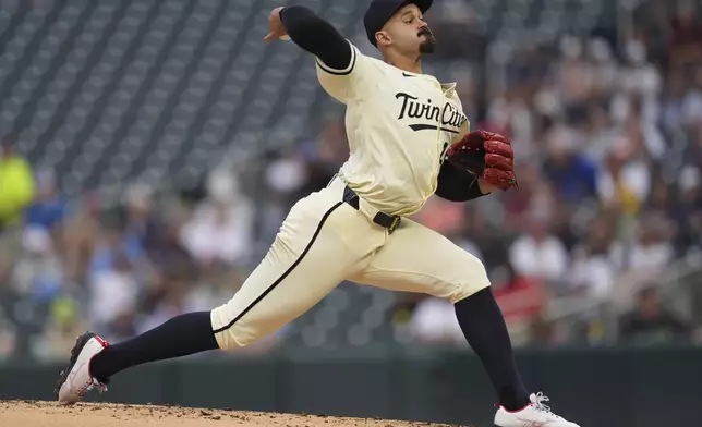 Minnesota Twins starting pitcher Pablo López delivers during the second inning of a baseball game against the Colorado Rockies, Wednesday, June 12, 2024, in Minneapolis. (AP Photo/Abbie Parr)