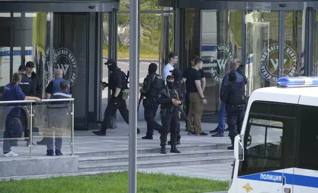 FILE - Police guard an area near an office of the Wagner Group, a private military contractor, in St. Petersburg, Russia, on June 24, 2023. Wagner chief Yevgeny Prigozhin launched a brief armed revolt against Russia's military leadership that posed the greatest challenge to President Vladimir Putin’s authority in his more than two decades in power. (AP Photo, File)