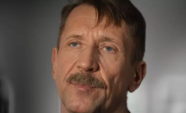 FILE – Russian arms dealer Viktor Bout, who was exchanged for WNBA star Brittney Griner, speaks to the media at an opening for an exhibition of his artwork at the Mosfilm studio in Moscow, Russia, on March 7, 2023. The U.S. successfully negotiated high-profile swaps in 2022 for Griner and Marine veteran Trevor Reed — both designated as wrongfully detained. Moscow Bout, who was serving a 25-year sentence, and pilot Konstantin Yaroshenko, serving 20 years for cocaine trafficking. (AP Photo/Alexander Zemlianichenko, File)