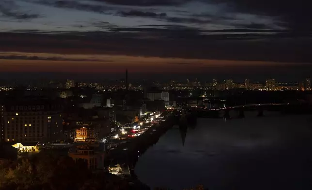 A general view of the central district of the city is seen during a blackout in Kyiv, Ukraine, Friday, June 7, 2024 (AP Photo/Alex Babenko)