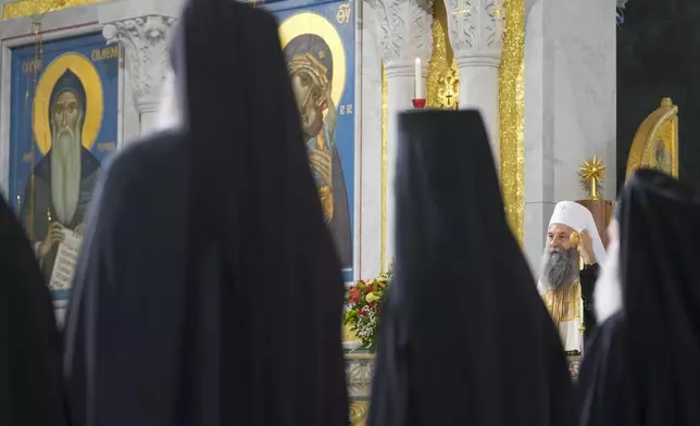 Serbian Orthodox Church Patriarch Porfirije performs during the prayer service for the All-Serbian Assembly in the St. Sava Serbian Orthodox temple in Belgrade, Serbia, Saturday, June 8, 2024. The All-Serbian Assembly carries the main message that Serbs, wherever they live, are one people, that they strive for the same goals. (AP Photo/Darko Vojinovic)