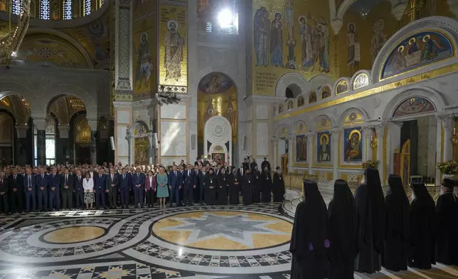 Officials from Serbia, Bosnian Serb and Montenegro political leaders attend the prayer service for the All-Serbian Assembly in the St. Sava Serbian Orthodox temple in Belgrade, Serbia, Saturday, June 8, 2024. The All-Serbian Assembly carries the main message that Serbs, wherever they live, are one people, that they strive for the same goals. (AP Photo/Darko Vojinovic)