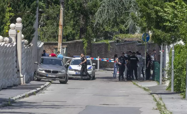 Police officers on a street close to the Israeli embassy in Belgrade, Serbia, Saturday, June 29, 2024. An attacker with a crossbow wounded a Serbian police officer guarding the Israeli Embassy in Belgrade. Serbia’s interior ministry says the officer responded by fatally shooting the assailant. (AP Photo/Marko Drobnjakovic)